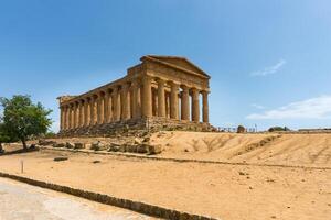 Agrigento, Italy-May 10, 2022-The Temple of Concordia inside the valley of the temples, an archaeological park near Agrigento during a sunny day photo
