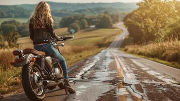 Woman on Motorcycle Riding on an Open Road photo