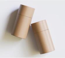 Brown Paper tube package mockups isolated on white background. Blank craft carton circular realistic tube texture. Cylindrical container with cap for product branding photo