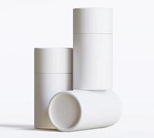 White Paper tube package mockups isolated on white background. Blank craft carton circular realistic tube texture. Cylindrical container with cap for product branding photo
