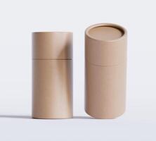 Brown Paper tube package mockups isolated on white background. Blank craft carton circular realistic tube texture. Cylindrical container with cap for product branding photo