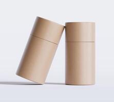 Brown Paper tube package mockups isolated on white background. Blank craft carton circular realistic tube texture. Cylindrical container with cap for product branding photo