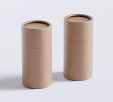 Brown Paper tube package mockups isolated on white background. Blank craft carton circular realistic tube texture. Cylindrical container with cap for product branding photo