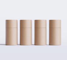 Brown Paper tube package mockups isolated on white background. Blank craft carton circular realistic tube texture. Cylindrical container with cap for product branding photo