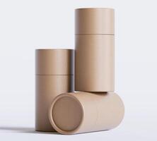 Brown Paper tube package mockups isolated on white background. Blank craft carton circular realistic tube texture. Cylindrical container with cap for product branding photo