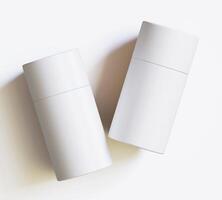 White Paper tube package mockups isolated on white background. Blank craft carton circular realistic tube texture. Cylindrical container with cap for product branding photo