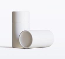 White Paper tube package mockups isolated on white background. Blank craft carton circular realistic tube texture. Cylindrical container with cap for product branding photo