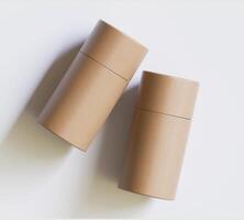 Brown Paper tube package mockups isolated on white background. Blank craft carton circular realistic tube texture. Cylindrical container with cap for product branding photo