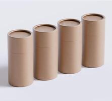 Brown Paper tube package mockups isolated on white background. Blank craft carton circular realistic tube texture. Cylindrical container with cap for product branding photo
