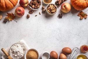 Autumn baking background with pumpkins, apples and nuts photo