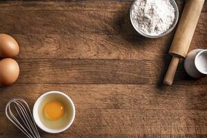 Baking background with flour, eggs, rolling pin. photo