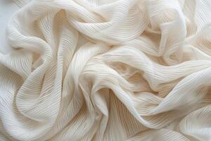 Soft, white fabric with delicate, linear texture patterns. photo