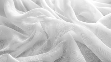 Soft, white fabric with delicate, linear texture patterns. photo