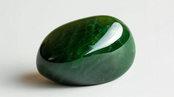 CloseUp of a Polished Jade Gemstone, Ideal for Jewelry Design, Home Decor, or Collectible Displays photo
