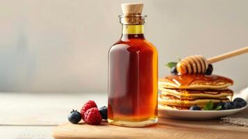 Rustic Breakfast Setting with Honey Syrup Bottle and Pancakes Decorated with Fresh Berries, Perfect for Kitchen Decor and Recipe Content photo