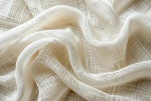 Soft, white fabric with delicate, linear texture patterns. photo