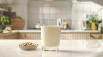 Fresh Soy Milk in a Clear Glass on Modern Kitchen Counter. PlantBased Beverage for Health and Nutrition. High Quality Stock Photo for Culinary Design and Promotion.