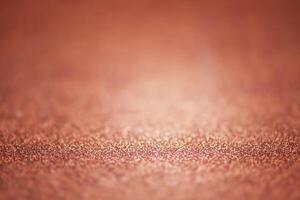 Brown abstract background with defocus and thin focal part. The glitter is brown photo