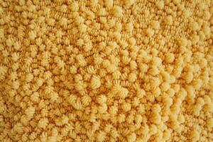 Boucle texture features a looped yarn that creates a unique, bumpy surface photo