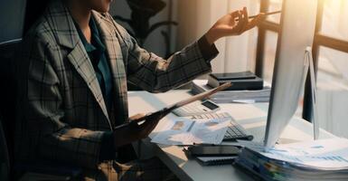 Team of business people working together in the meeting room office, teamwork background charts and graphs banner, double exposure successful teamwork,business planning concept. photo