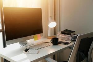 messy office workspace. Messy and cluttered office desk. Messy business office with piles of files and disorganized clutter. photo