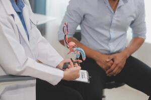 Urologists advise patients about prostate problems. Treatment of cancers of the urinary tract and male reproductive organs The concept of men's health problems Close-up pictures photo