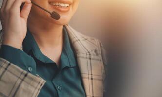 Call center, computer and business with woman in office for customer service, technical support and advice. Technology, contact us and communication with employee operator in help desk agency photo