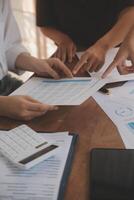 Business meetings to analyze investment strategies and brainstorm sales plans for a more profitable business. photo