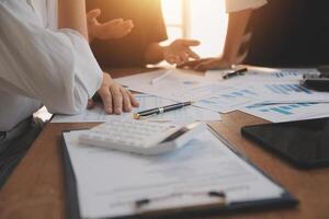 Business meetings to analyze investment strategies and brainstorm sales plans for a more profitable business. photo