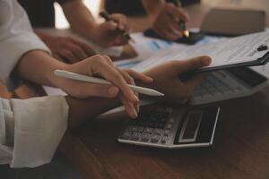 Business meetings to analyze investment strategies and brainstorm sales plans for a more profitable business. photo