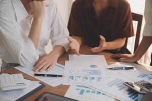 Business meetings to analyze investment strategies and brainstorm sales plans for a more profitable business. photo
