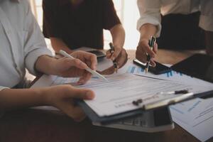 Business meetings to analyze investment strategies and brainstorm sales plans for a more profitable business. photo