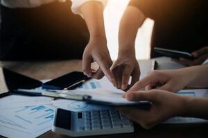 Business meetings to analyze investment strategies and brainstorm sales plans for a more profitable business. photo
