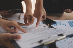 Business meetings to analyze investment strategies and brainstorm sales plans for a more profitable business. photo