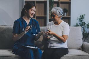 Doctor consulting with patient discussing something and Presenting results on report, Medicine and health care concept. photo