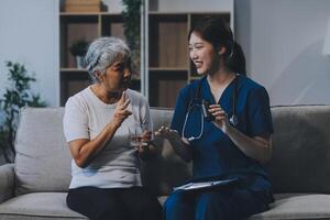 Doctor consulting with patient discussing something and Presenting results on report, Medicine and health care concept. photo