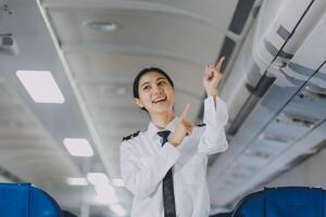 Portrait of a trained airplane captain in uniform preparing to fly, event planning in airplane. photo
