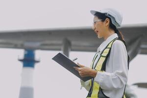 Technician fixing the engine of the airplane,Female aerospace engineering checking aircraft engines,Asian mechanic maintenance inspects plane engine photo