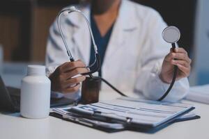 picture of doctor hand with stethoscope listening something photo