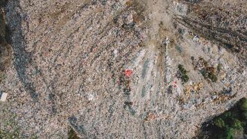Garbage Vs Nature Stark Contrast. Mountains Of Trash Aerial. photo
