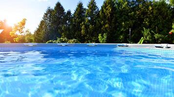 Natural garden with water pool. Garden on the background. Pool with clean water. photo