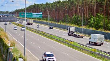 Warsaw, Poland. 24 July 2024. View of cars on the expressway S2, southern bypass of Warsaw in Wawer district. photo