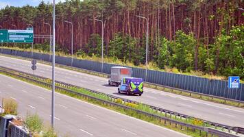 Warsaw, Poland. 24 July 2024. View of cars on the expressway S2, southern bypass of Warsaw in Wawer district. photo