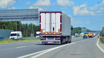 Warsaw, Poland. 15 July 2024. View of cars on the expressway S2, southern bypass of Warsaw in Wawer district. photo