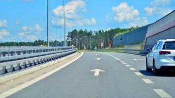 Warsaw, Poland. 15 July 2024. View of cars on the expressway S2, southern bypass of Warsaw in Wawer district. photo