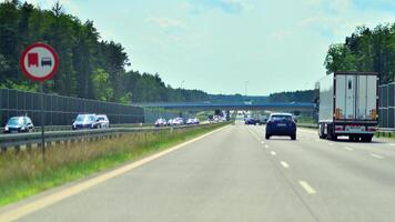 Warsaw, Poland. 15 July 2024. View of cars on the expressway S2, southern bypass of Warsaw in Wawer district. photo