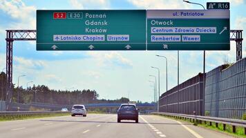 Warsaw, Poland. 15 July 2024. View of cars on the expressway S2, southern bypass of Warsaw in Wawer district. photo