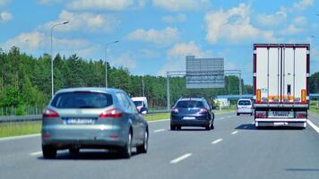 Warsaw, Poland. 15 July 2024. View of cars on the expressway S2, southern bypass of Warsaw in Wawer district. photo