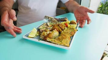 Chef Serves Main Course With Fine Fish In A Seaside Restaurant video