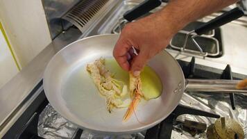 Chef Is Frying Fresh Prawns With Olive Oil In A Pan Of A Restaurant video